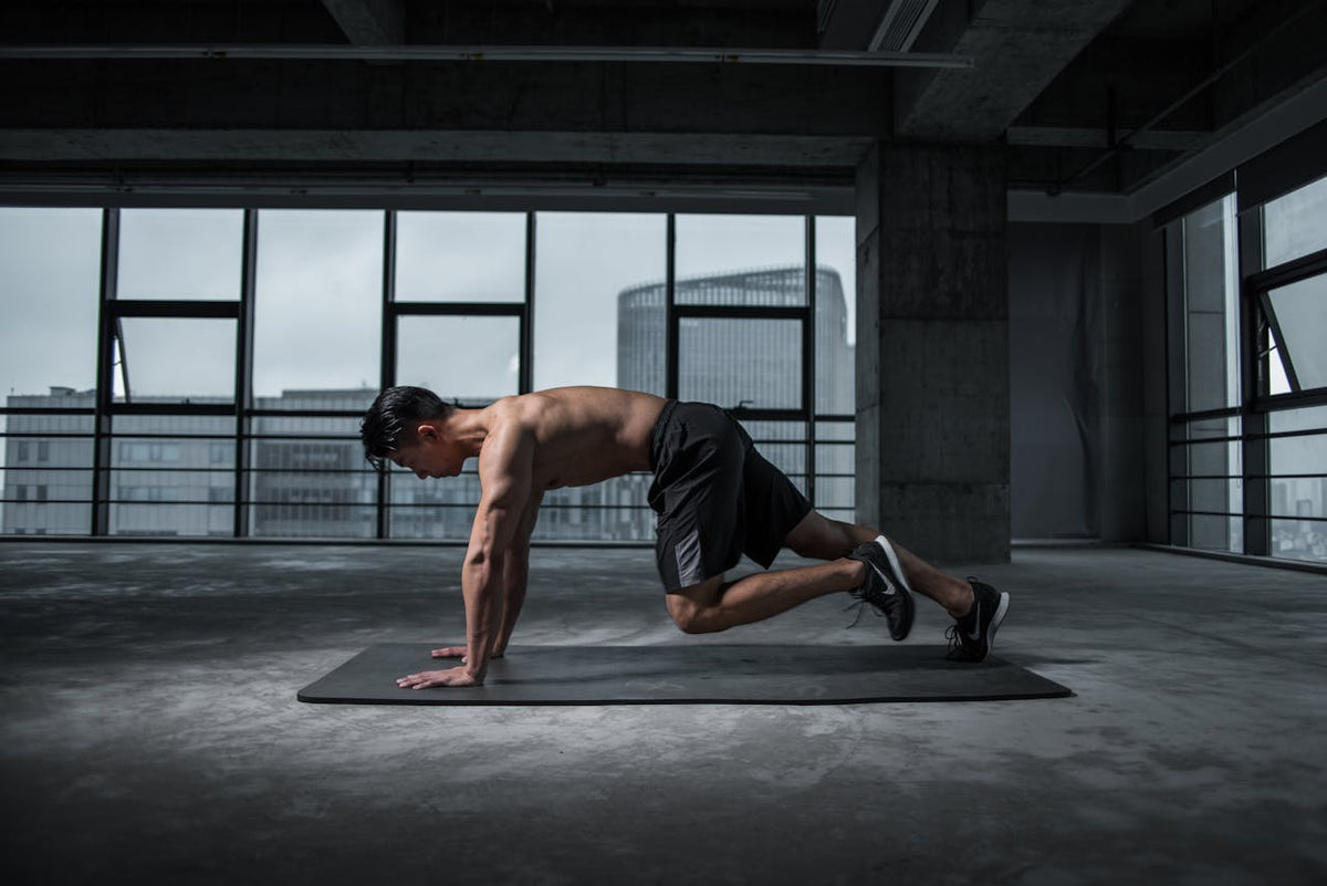 Man doing exercise on mat