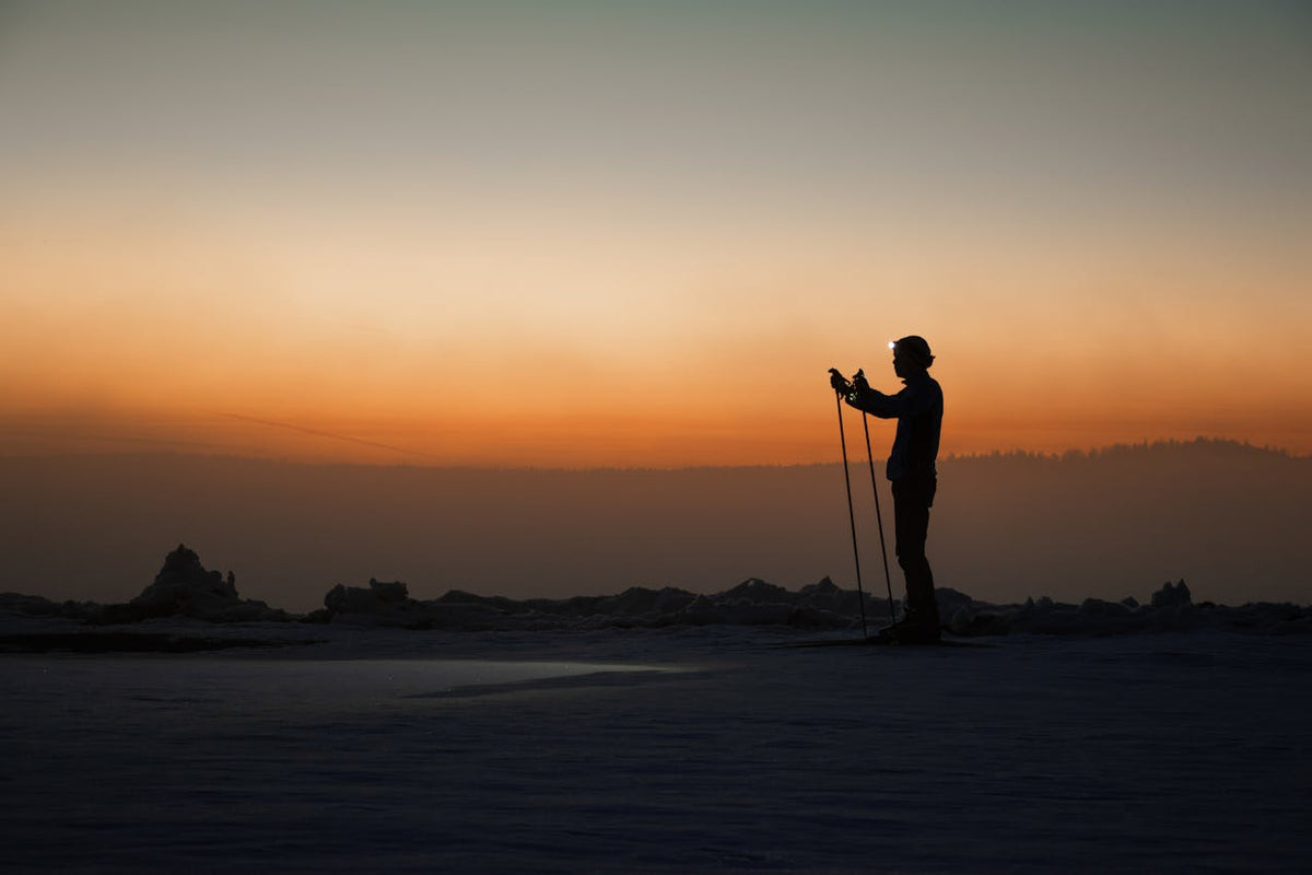 Man using headlamp at dusk