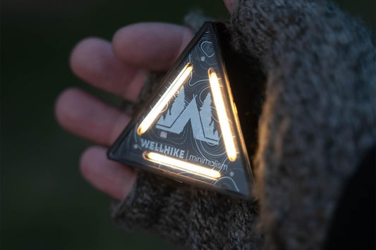 Wellhike Safey Beacon illuminated in hand