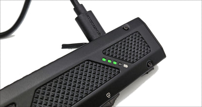 Black electronic device with textured surface and visible branding on a white background